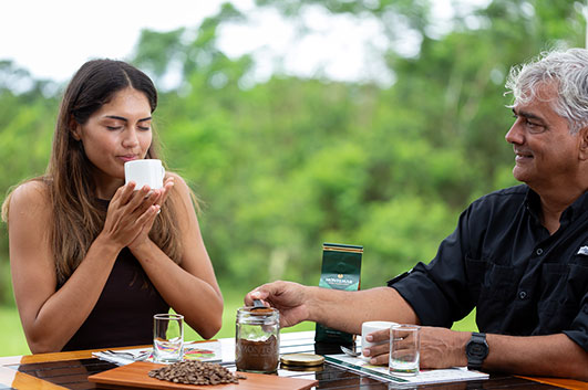 Guest tasting the famous Montemar Tortoise Salvation Coffee