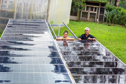 Reyna and Roberto on the site of solar panel system in Montemar