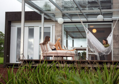 Picture from outside showing two guests on Villa Lechuza deck