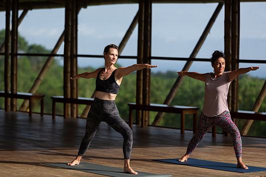 Wellness activities, like Yoga for you during your stay in one of Montemar Luxury Eco Villas